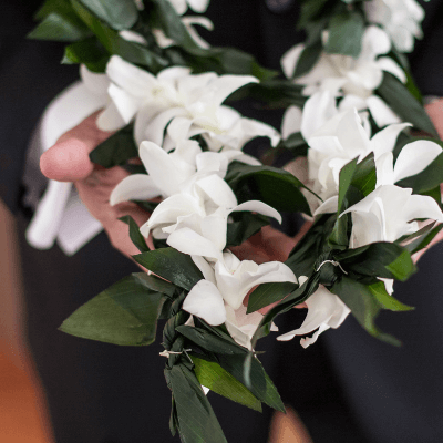 maile and white orchid lei